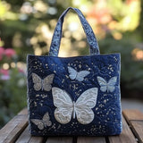 Bolsa artesanal com borboleta prateada